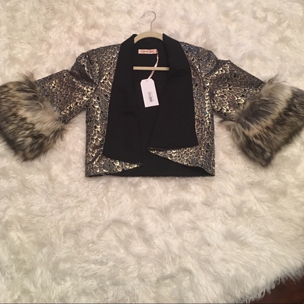 Statement jacket with faux fur trim